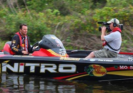 Kevin VanDam idles out of Mack's Fish Camp to start Day Four.