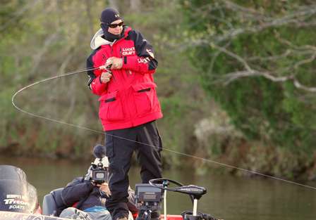 Casey Ashley, still bundled up from a long boat ride, hooks up with a Wheeler Lake bass early on Day Three.