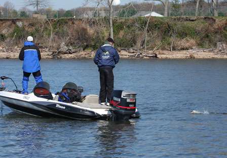 James Kline fights a bass to the boat. It too would be too small for the 15-inch minimum length limit.