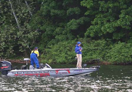 Elite Series Pro Mark Menendez sets the hook on a Wheeler Lake bass as his co-angler Michael Bass goes for the net.