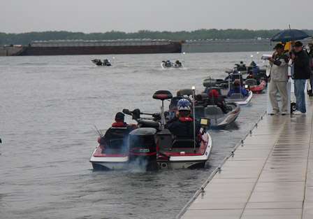 Light rain continued to fall as the final boats made their way through the BASS inspection process to launch onto Wheeler Lake.