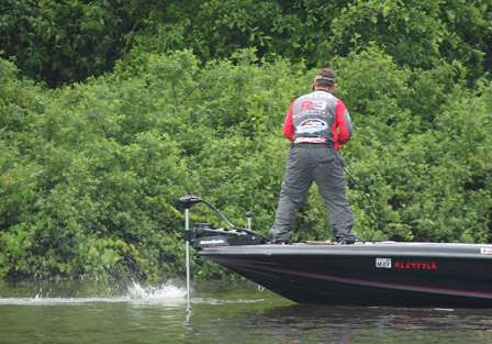 The onslaught continues as Payne brings another bass to the boat as the skies start to spit rain.