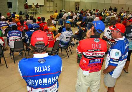 Elite Series anglers and Marshals sit across the room from one another as the pairings for Day One are announced.