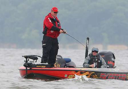 Mark Davis fights a fish to the boat on Kentucky Lake.