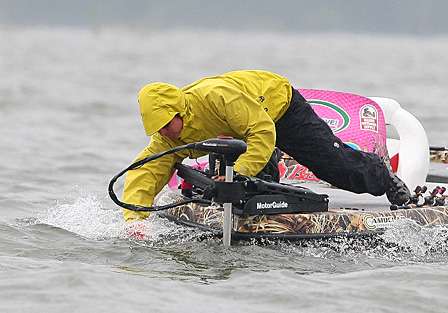 Kevin Short fights waves on a very rough Kentucky Lake while trying to retrieve a marker buoy.