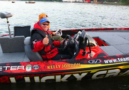 Kelly Jordon gives the thumbs up that his boat has a clean bill of health after he barely made it back to the Day Two weigh-in.
