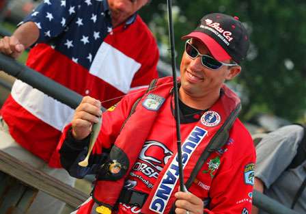 Britt Myers holds a swimbait that helped him make his first top-12 cut of the year.