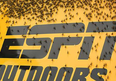 Swarms of mayflies collect on ESPN Outdoors production trucks parked along the Mississippi River.