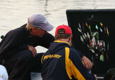 Kevin Short examines the baits on Mike McClelland's boat. Both fished Hole Two, and Short provided McClelland a show. 