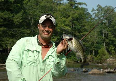 James Hall caught this 14 1/2-inch shoal bass by drifting a craw through shoals into a small eddy.