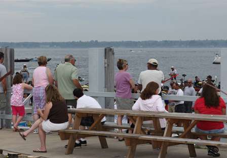 Fans litter the dock as they watch the anglers come in for the Day Two weigh-in. 