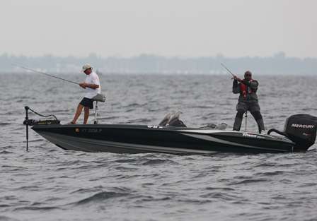 Mark Hickory and Alonzo Evans are targeting smallmouth bass out on the open lake nearby.