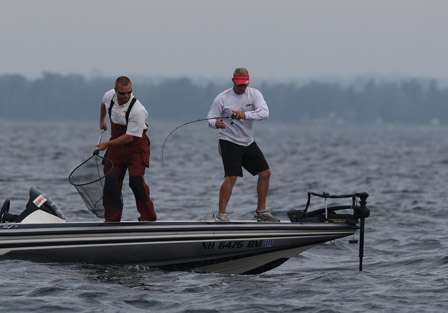 We catch up with Scott Parker nearby on the open water targeting smallmouth like many others have all week. It isn't long before he is hooked up.
