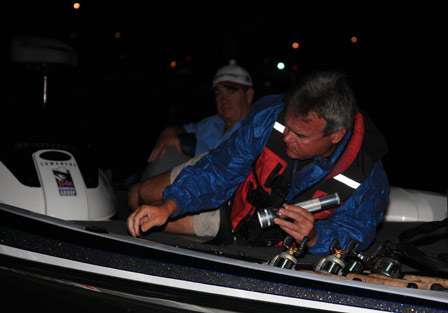Danny Owens straps down his rods in preparation for the Day One launch of the second stop of the Central Opens.