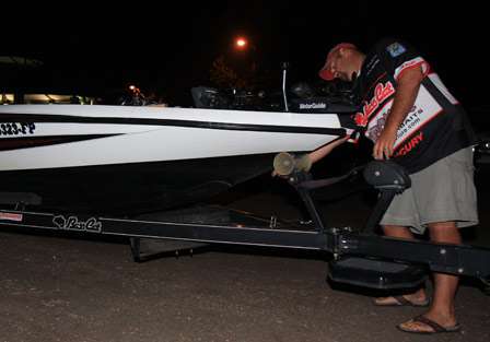 Chris Burnham preps his boat for launch at the ramp at the Umphrey's Family Pavilion.