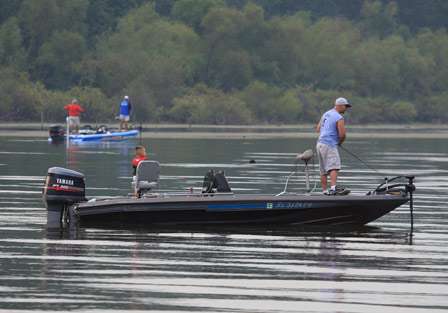 A father and his son fish within a short distance of Bassmaster Elite Series pro Matt Reed. 