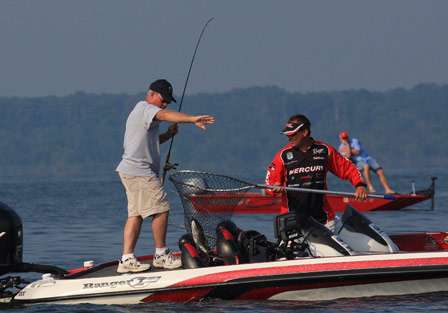 Pro Stephen Johnston repays the favor for Babby Lanham as he nets a nice bass, allowing Lanham to 