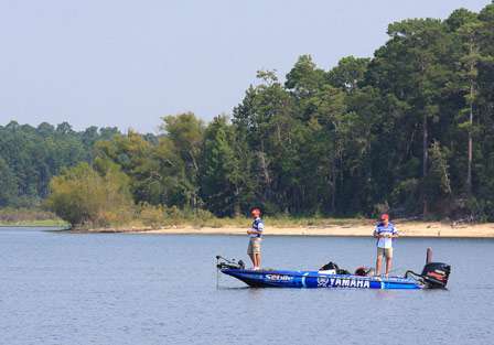 Bassmaster Elite Series pro Todd Faircloth and his co-angler Claude Rabb continued to pick apart the grass on an open flat for most of the morning.