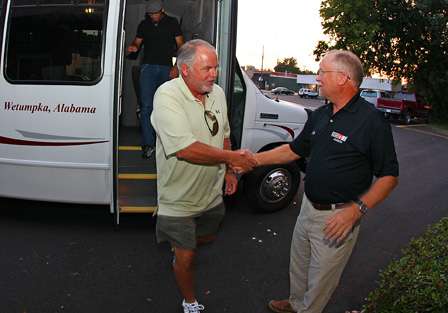 BASS Senior Tournament Manager Chuck Harbin greets Tommy Biffle as he exits the bus for dinner. Biffle qualified for the postseason by finishing seventh in the Toyota Tundra Bassmaster Angler of the Year standings. 