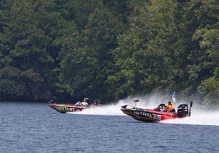 Kelly Jordon and Kevin VanDam race north toward Mitchell Dam as water was released into Lake Jordan. 