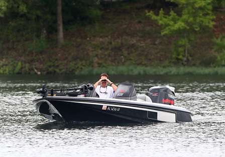 Spectators brought their binoculars to watch from a distance while the Toyota-12 Elite Series pros fished their final day of practice on Lake Jordan. 
