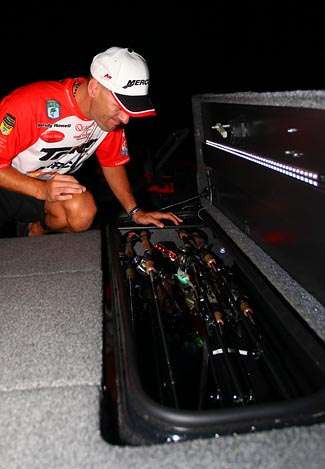 Randy Howell checks his rod locker before launch of the Berkley Powerbait Trophy Chase on Lake Jordan.