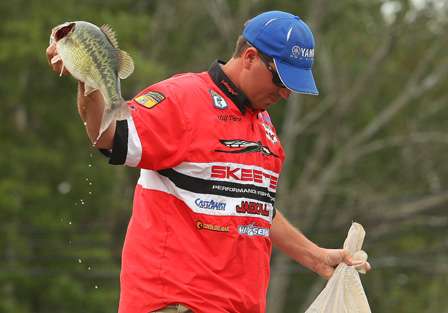Cliff Pace pulls out a fat Coosa River spotted bass before bringing his bag to the scales.