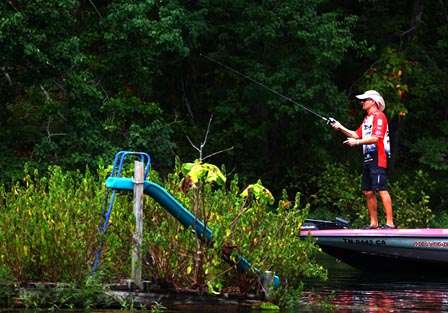 Howell fishes behind a slide.