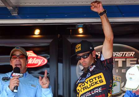 Mike Iaconelli gives a fist-pump after taking the lead in the Berkley Powerbait Trophy Chase on Lake Jordan. 