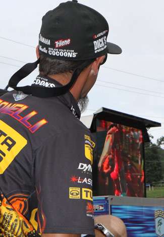 Elite angler Michael Iaconelli watches his video introduction on the Jumbo-Tron.