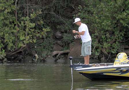 Elite pro Gerald Swindle makes a grimace as he sees the size of the fish. Swindle remarks, 
