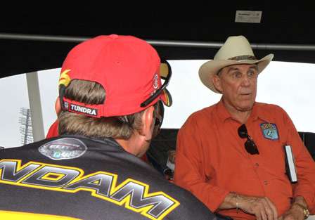 BASS Founder Ray Scott speaks with the competitors back stage prior to weigh in.