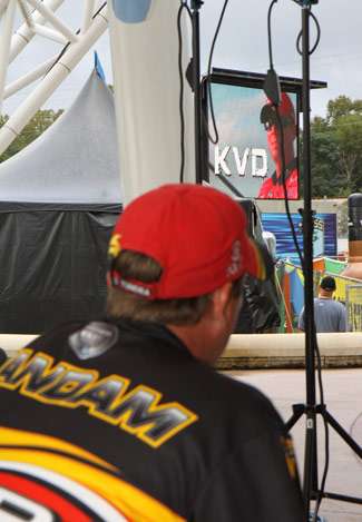 Elite pro Kevin VanDam watched his introduction on the jumbotron as he waits backstage to weigh his fish. He was holding the biggest bag of the day and would take the lead on Day One.