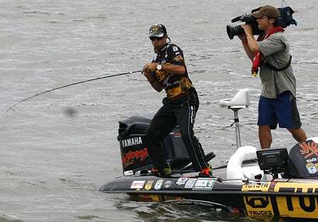 Michael Iaconelli pulled up about 20 yards from the dock and, in front of a crowd of about 200, started pulling bass into the boat.