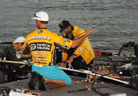 Elite pro Gerald Swindle puts away his gear before bagging his fish.