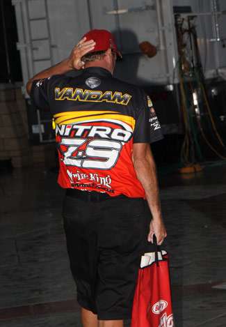 Elite pro Kevin VanDam leaves the tanks and heads to the back stage area where he will wait to take the stage.