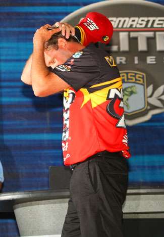 As the winning moment sinks in, VanDam takes a moment to gather his emotions before hoisting his trophy.