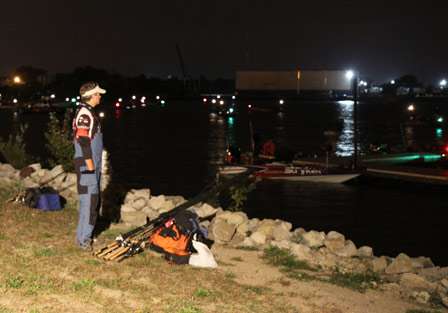 Co-angler Justin Teske watches the docks early on Day One, looking for any sign
of his Day One pro.