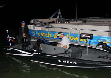 The sound of a NOAA weather radio, repeating local conditions, could be heard coming from the boat of Steve Oleksyn, as he and his co-angler Larry Baer make final preparations.