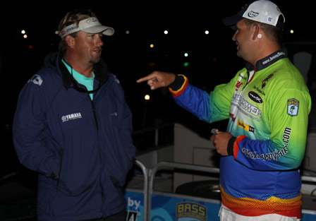 Bassmaster Elite Series pros J Todd Tucker (left) and Jeremy Starks talk strategy for Day One of competition on Lake Erie.