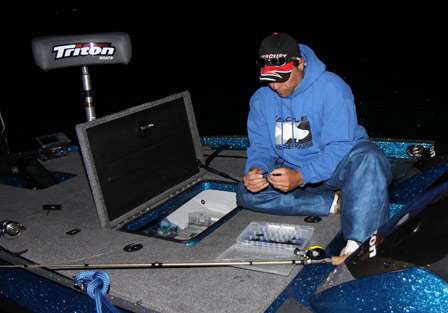 Pro Richard Favire takes time to make a lure change before the Day One launch on Lake Erie.