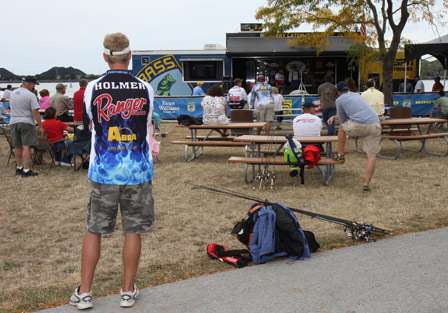 As the pros and co-anglers finished getting their official weight, many stood and watched the rest of the weigh-in to see where they would end up in the standings.
