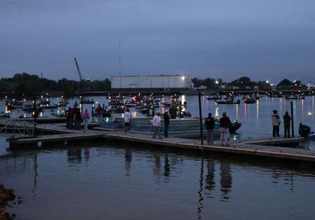 As the launch gets underway, fans start to gather near the docks to root on their favorite anglers.
