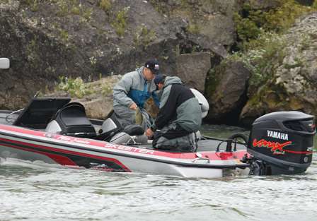 Matt Greenblatt places his catch into the livewell, bringing him one fish closer to his limit.