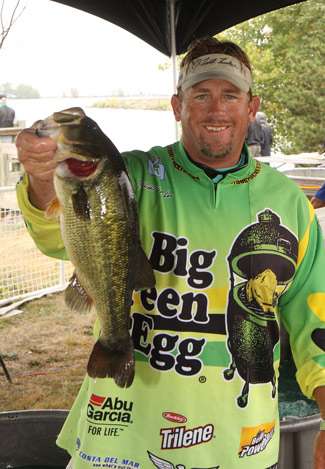 J. Todd Tucker holds up a largemouth bass, a species that very few anglers targeted this week on Lake Erie. The anglers that did would get a limit of green bass and head for the bronze-backs to upgrade.