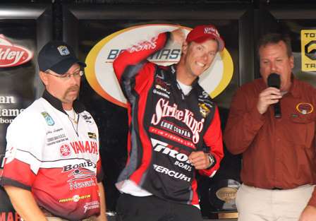 Pro Jonathon VanDam celebrates as soon as he hears his weight, knowing he had knocked Scalish from the 