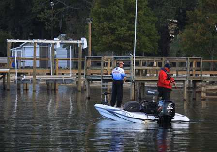 Pro Landon Lomax and his co-angler Clarence Pinkerton work docks in a secluded cove on Santee Cooper Reservoir.