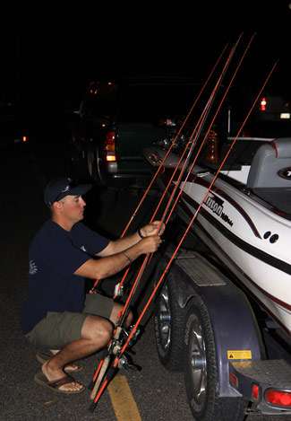 Bret Moore separates his rods and preps his gear before loading up with his Day Three pro Frank Jordan Jr.
