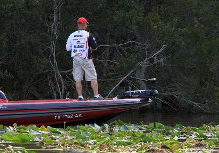 Nick Wood works close to the bank on the Harris Chain of Lakes in Tavares, Fla.