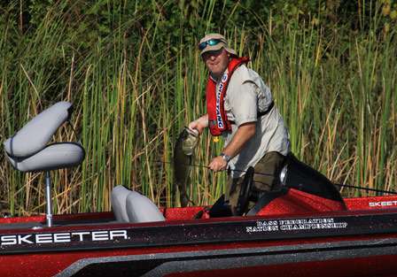 Hogue puts a solid keeper in the boat, his first fish for the day.
